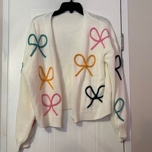 Cream Open-Front Cardigan Sweater with Multicolor Bow Accents